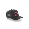 A side view of a black cap with a pink embroidered Steadyrack logo on the front and side, featuring a mesh back.