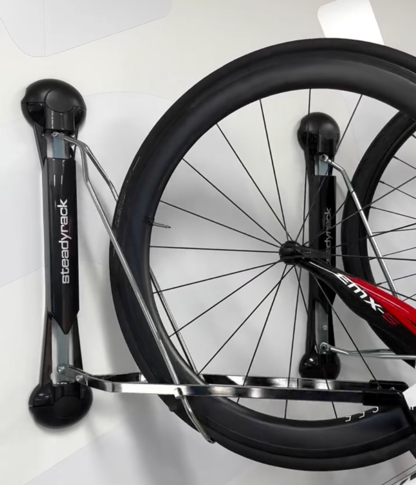 A close up shot of a road bike front tyre stored in a Steadyrack bike rack.