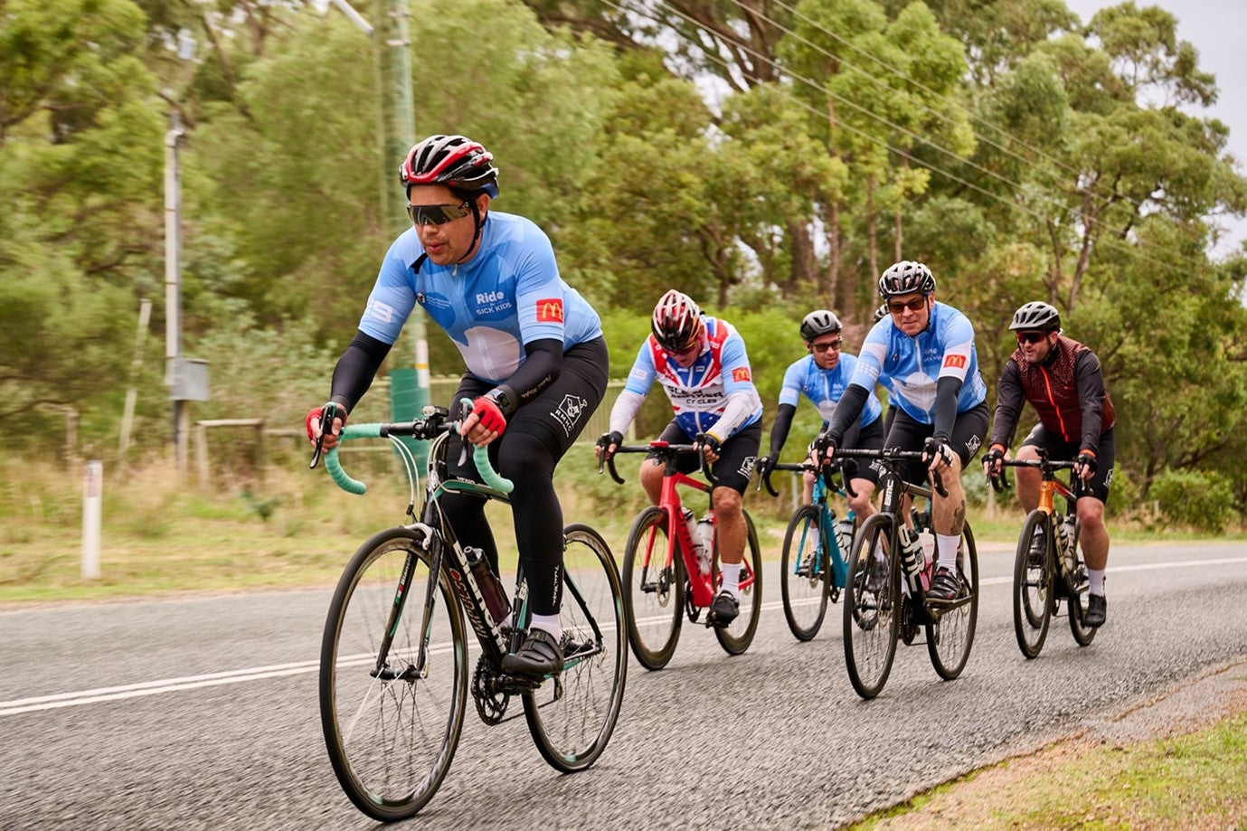 Cyclists on the road participating in the RMHC ride for sick kids